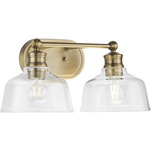 Singleton Collection Two-Light 17" Vintage Brass Farmhouse Vanity Light with Clear Glass Shades