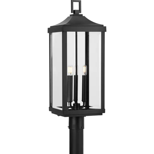 Black three-light post lantern with clear beveled glass shades.